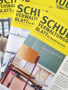 Schulverwaltungsblatt im Bild - Collage aus drei Heften