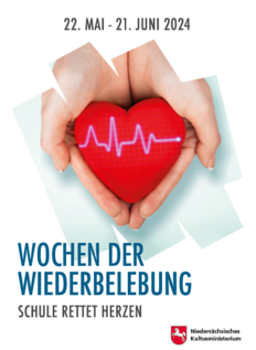 ein rotes Herz liegt in zwei geöffneten Händen, darunter Schriftzug in blau Wochender Wiederbelebung Schule rettet Herzen