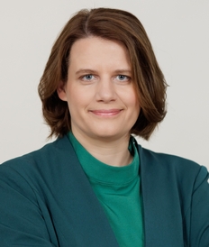 Kopfbild einer Frau mit freundlichem selbstbewussten Blick